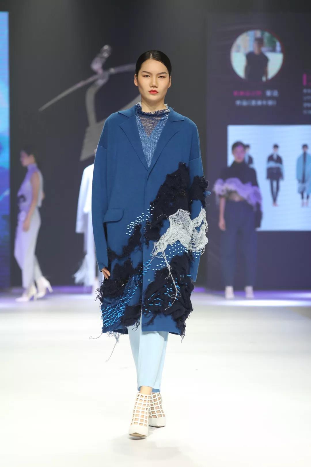 学部教师安达荣获纺织世界杯第十七届中国大朗毛织服装设计大赛银奖